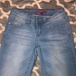 “WannaBettaButt?” Skinny jeans.